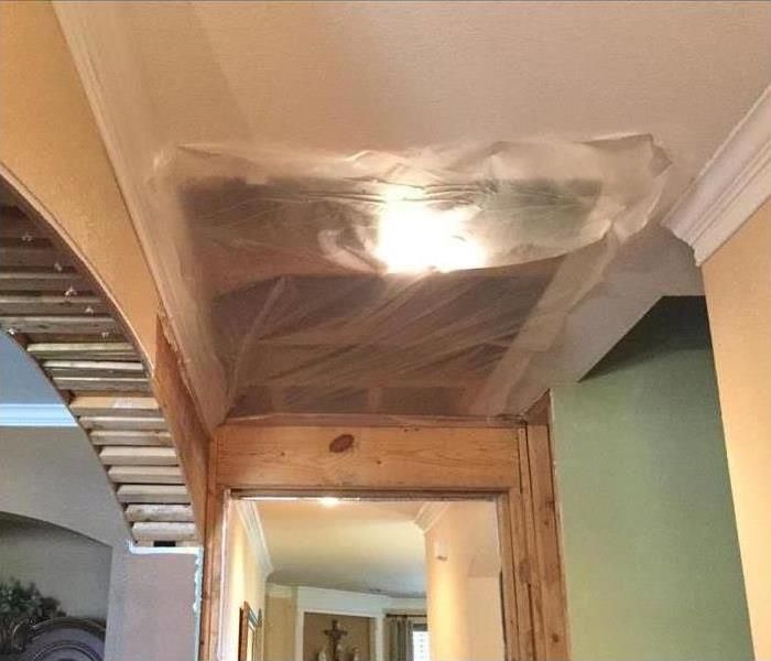 Covered up hole in ceiling before repairs
