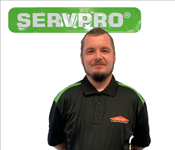 Dylan Joiner, SERVPRO green sign behind his cutout picture, white background