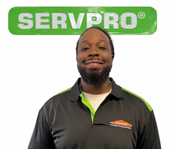 Rodney, SERVPRO employee in uniform, cut out in front of white background