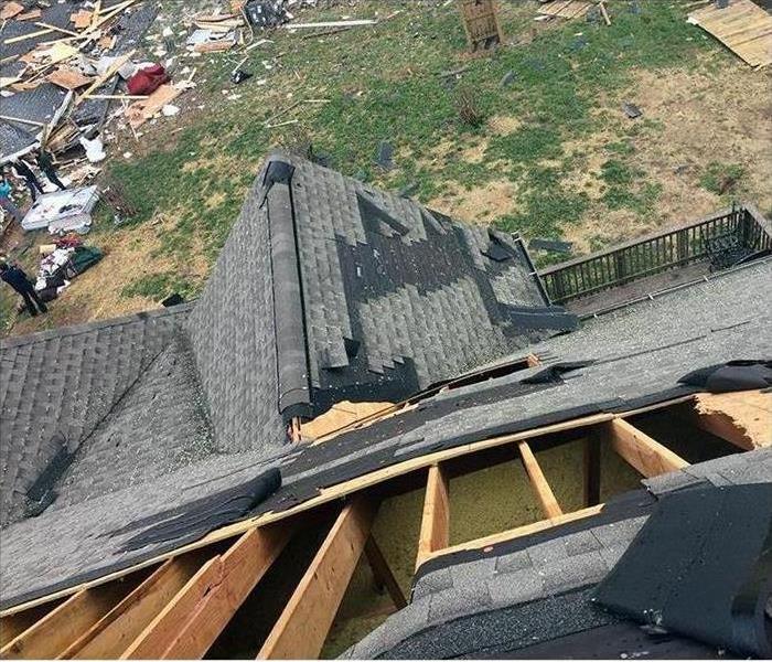 Roof with storm damage